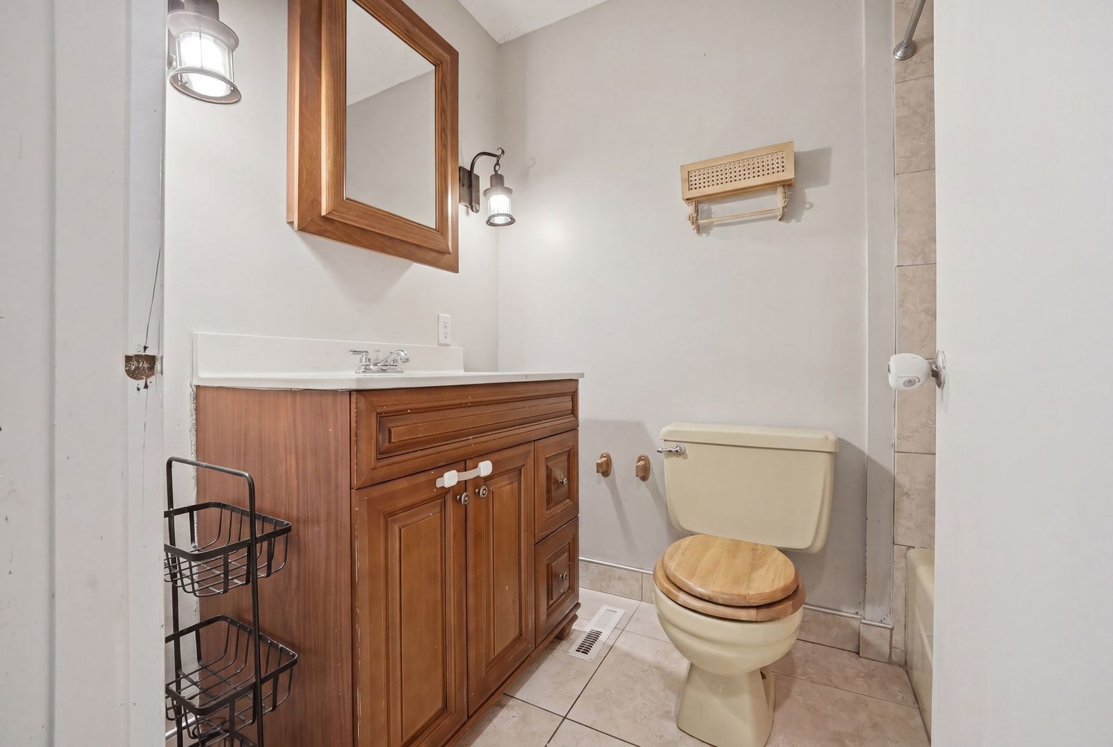 5645 Beebe Drive Rochelle, IL 61068 - Photo 30 of 43 a bathroom with a toilet a sink and mirror
