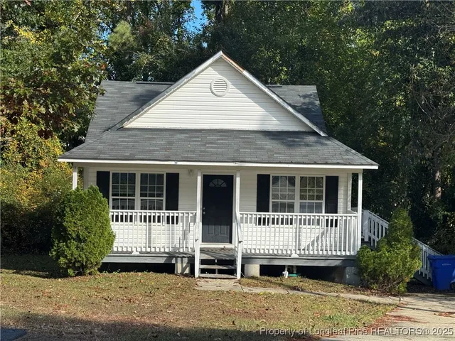 a view of a house with a garden