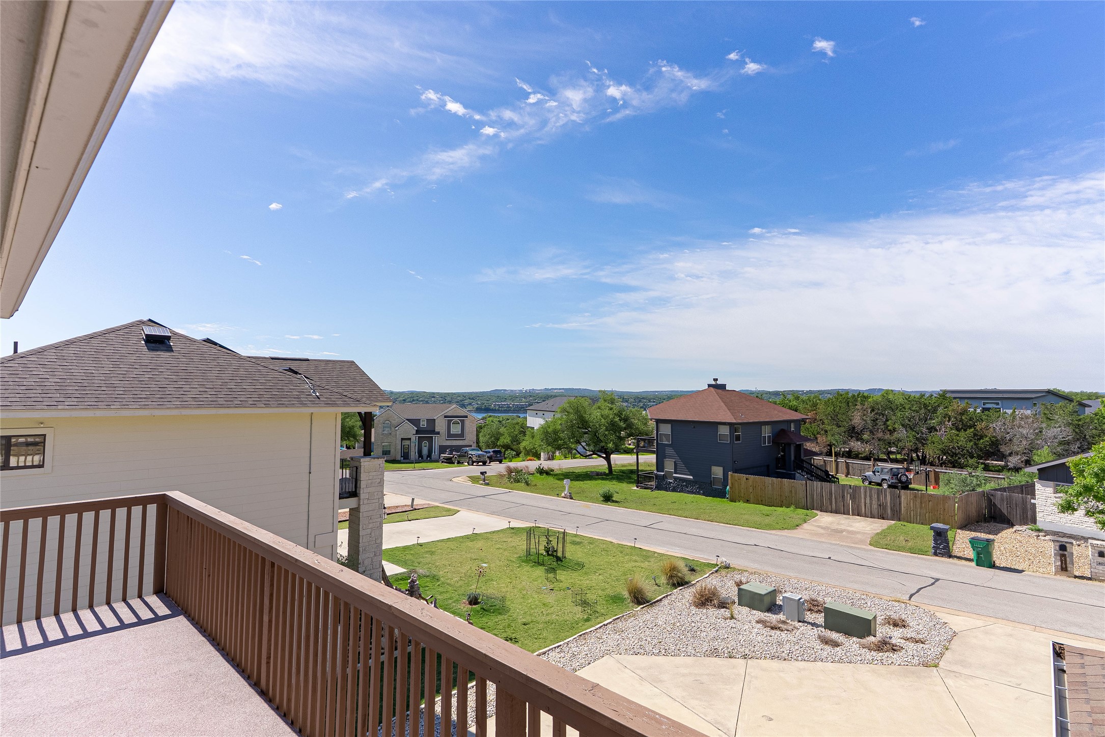 410 Summit Ridge Drive North Point Venture, TX 78645 - Photo 17 of 37 a view of a balcony with two chairs and a table