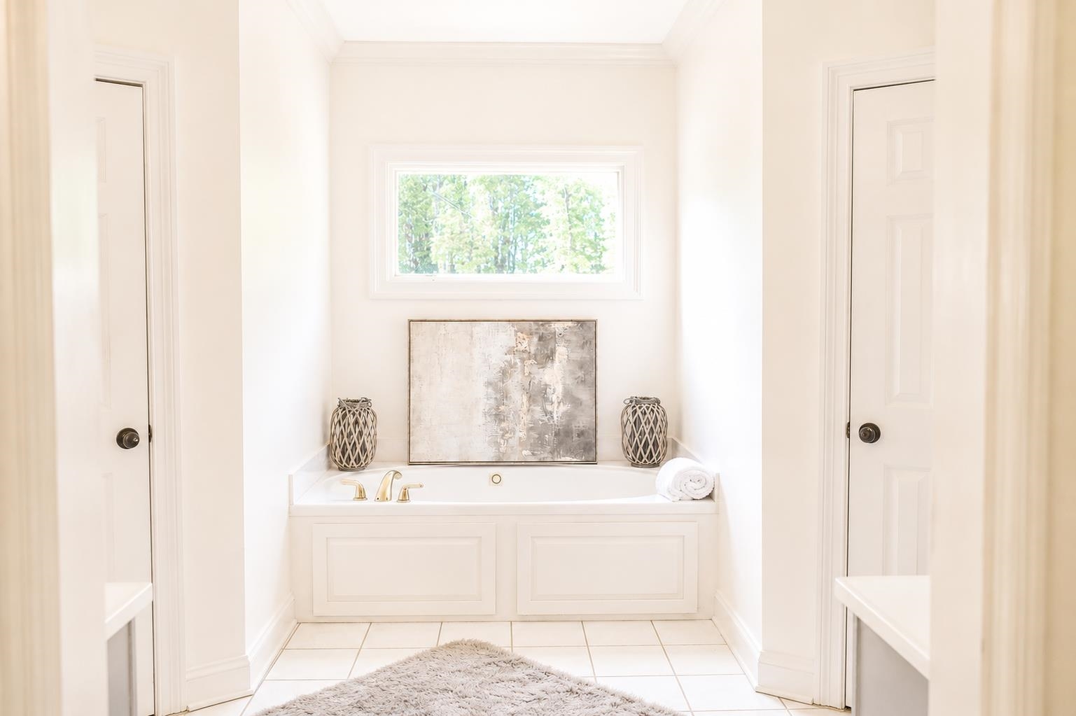 565 Schaeffer Loop Eads, TN 38028 - Photo 20 of 40 a bathroom with a bathtub and shower