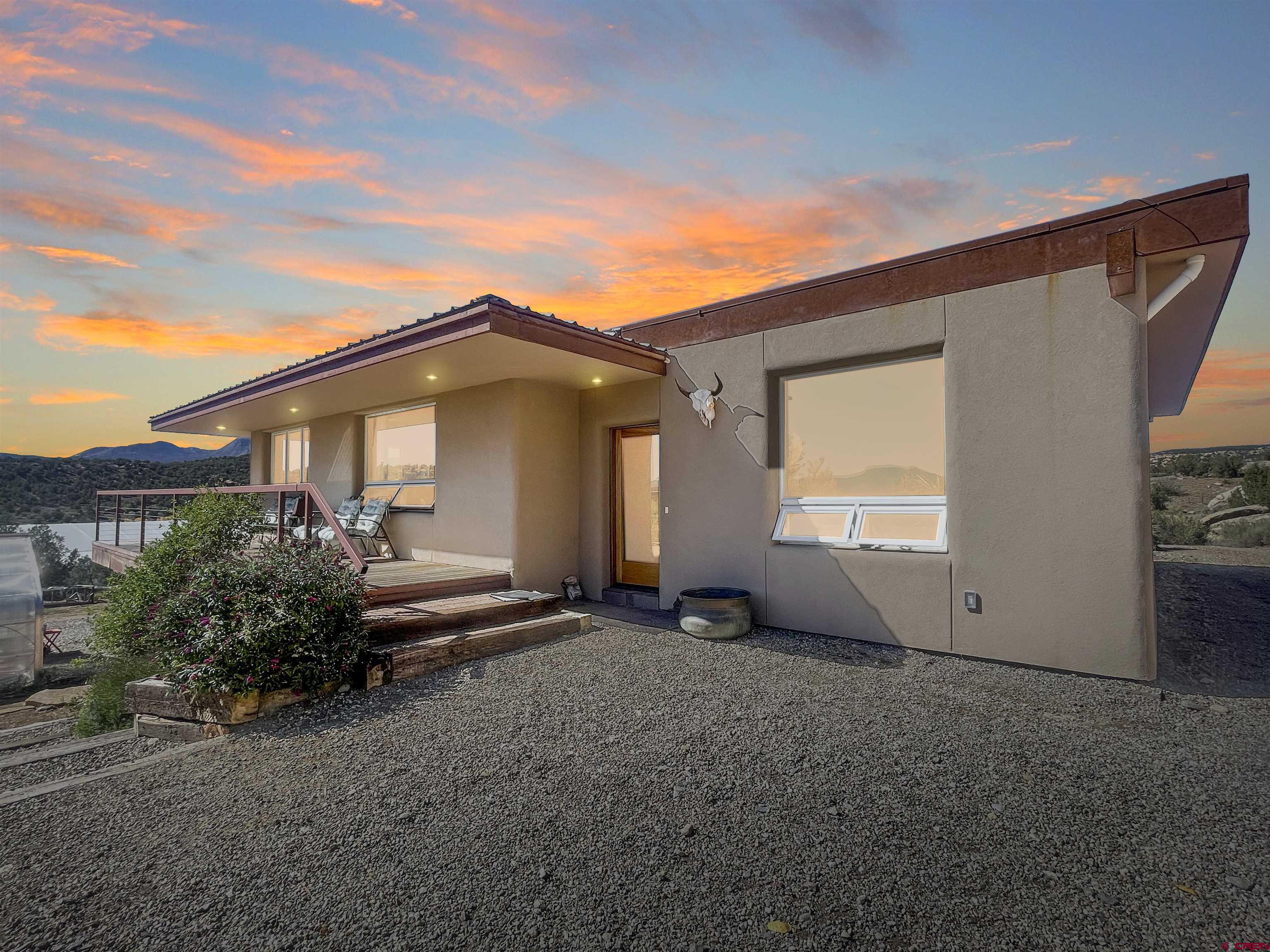 20615 Rd G Cortez, CO 81321 - Photo 15 of 43 a view of a house with backyard and garden