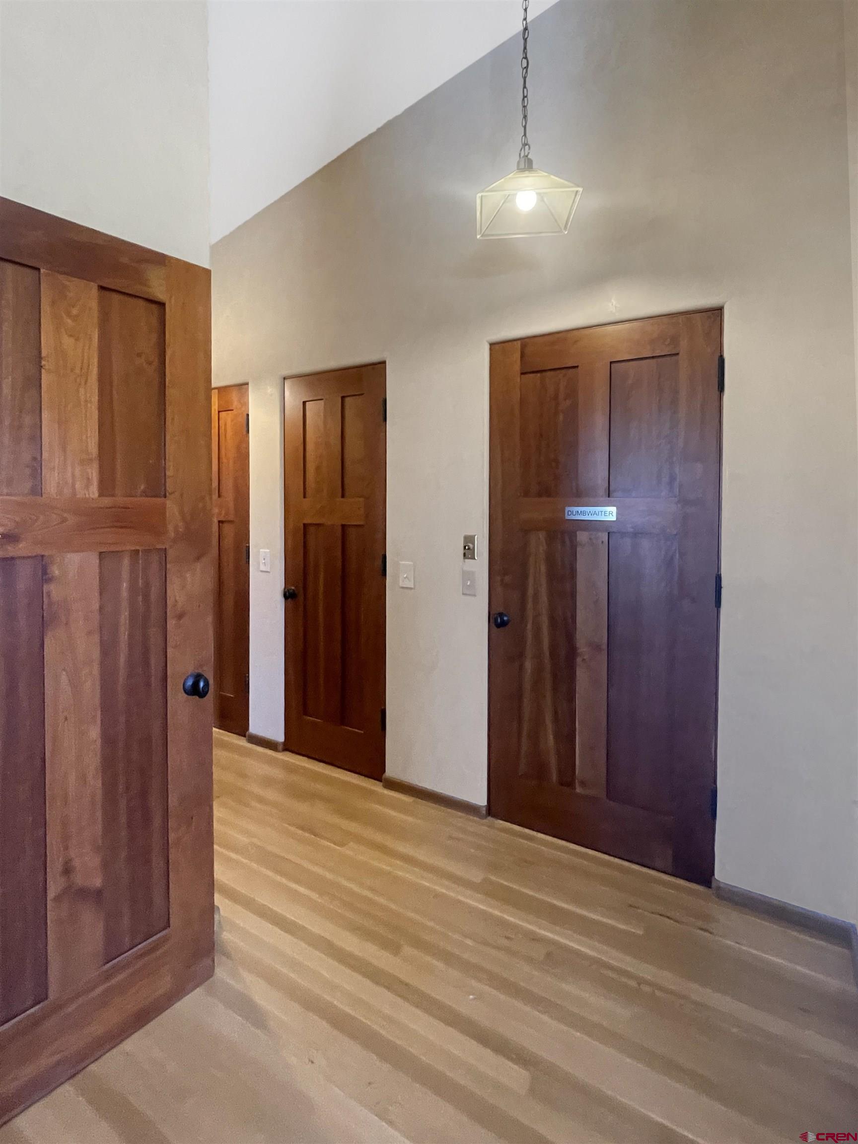 20615 Rd G Cortez, CO 81321 - Photo 32 of 43 a view of empty room with wooden floor
