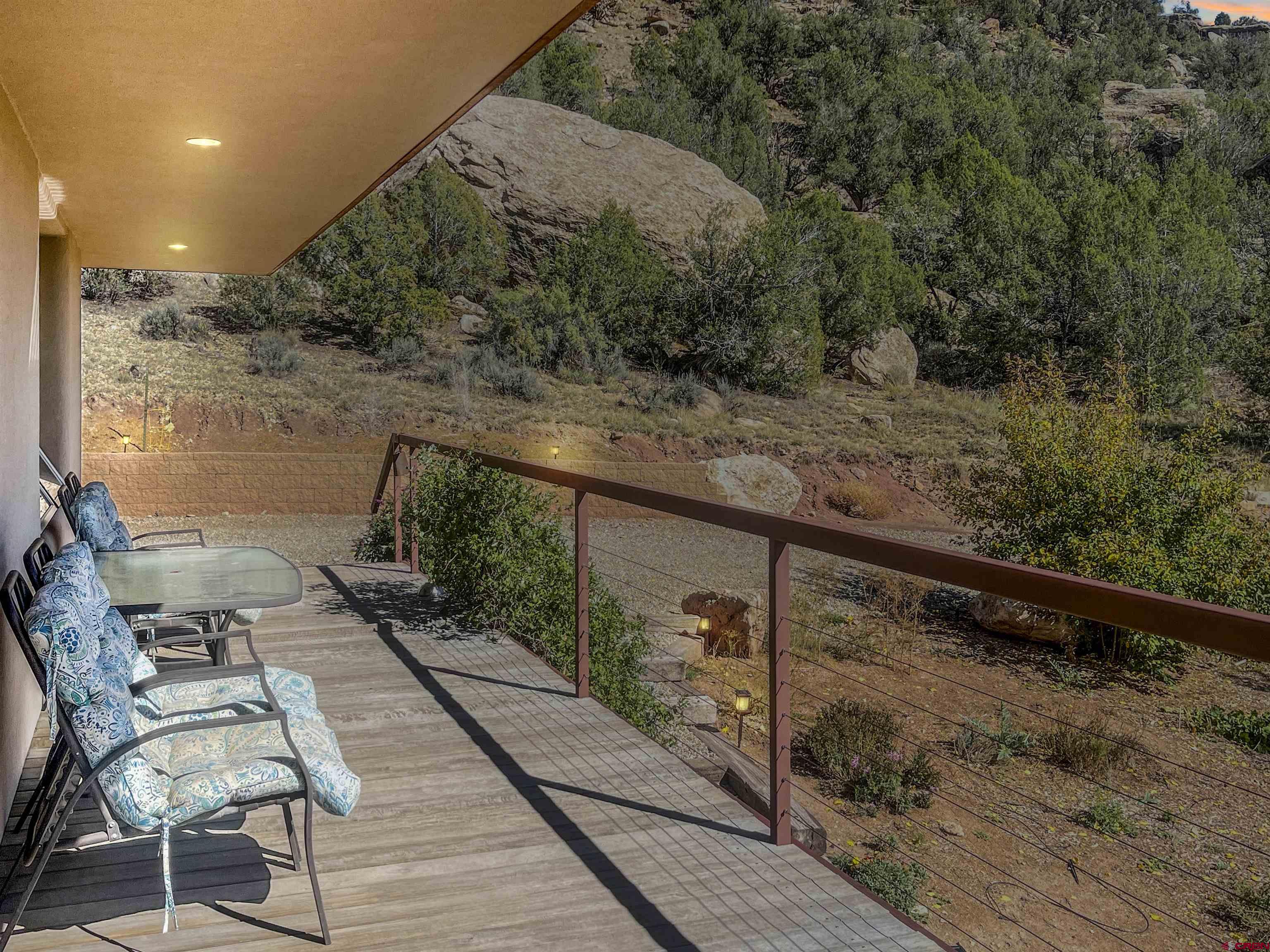 20615 Rd G Cortez, CO 81321 - Photo 4 of 43 a view of balcony with wooden floor and seating space