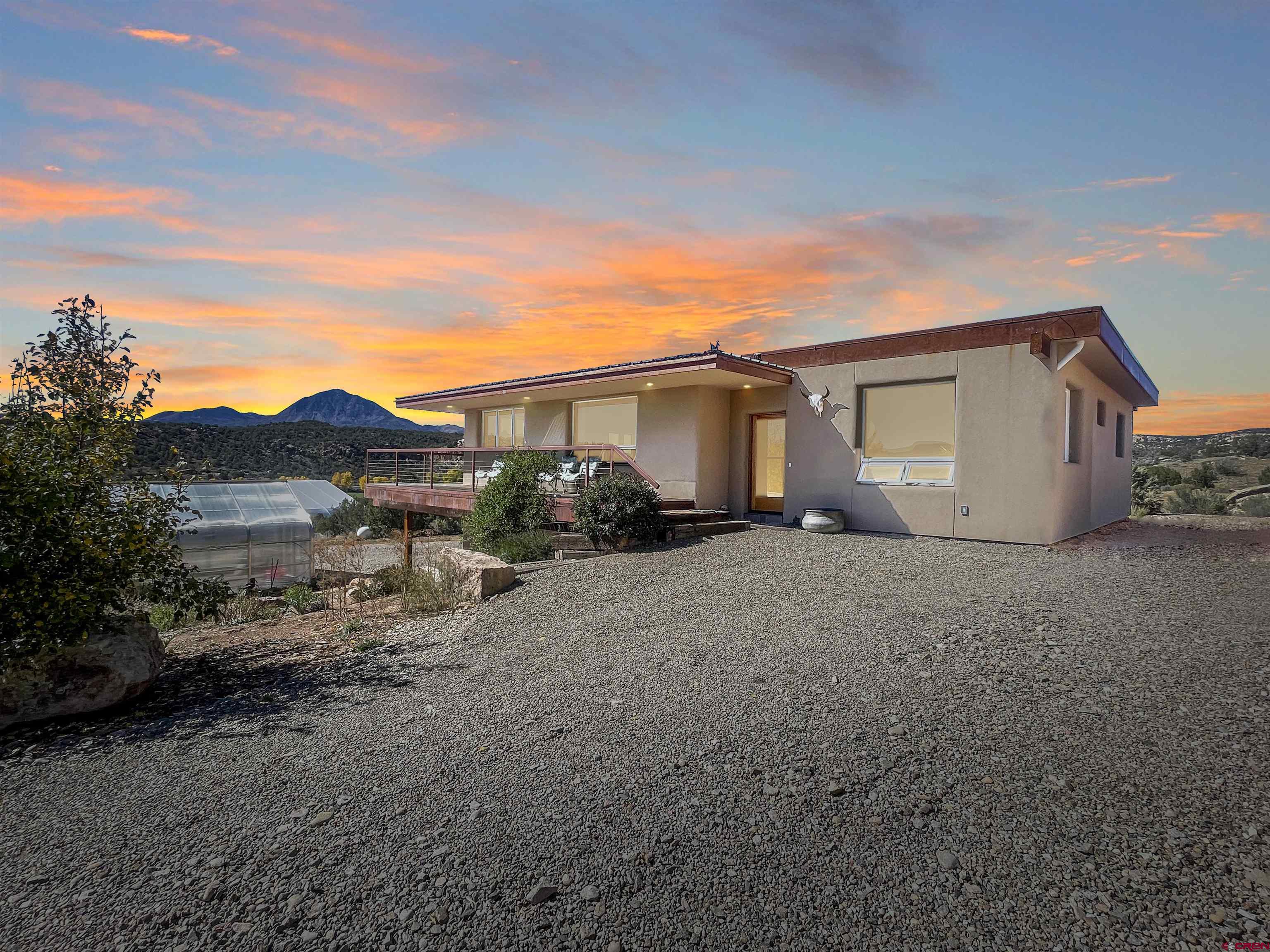 20615 Rd G Cortez, CO 81321 - Photo 10 of 43 a view of a house with a patio