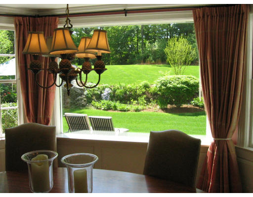 44 Audubon Road Wellesley, MA 02481 - Photo 11 of 17 a view of a porch with furniture and yard