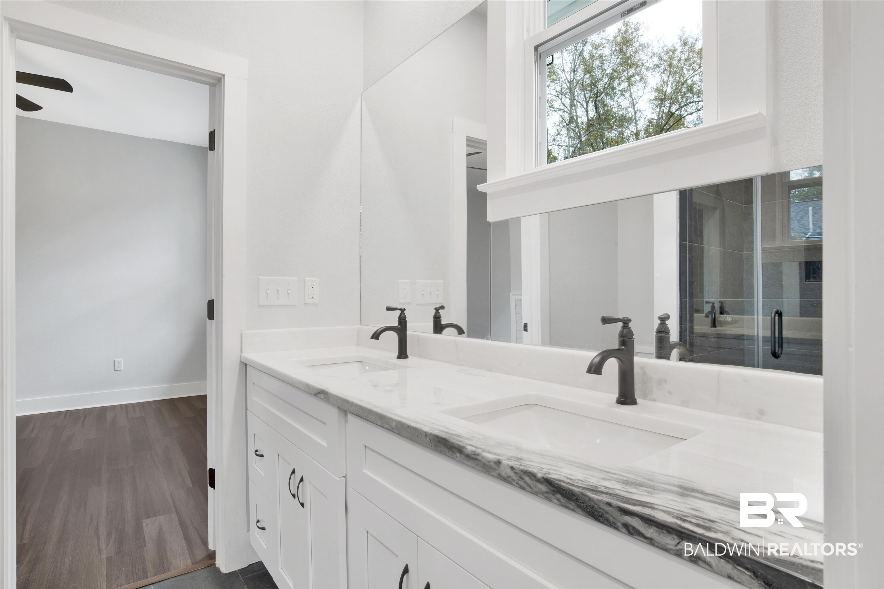 302 1st Street Mobile, AL 36611 - Photo 18 of 28 Bathroom with hardwood / wood-style flooring, vanity, and walk in shower