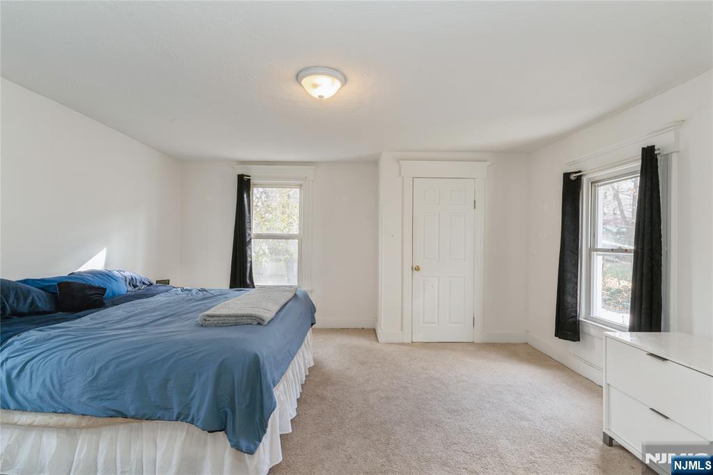 656 Scotland Road Orange, NJ 07050 - Photo 13 of 23 a bedroom with a bed and window