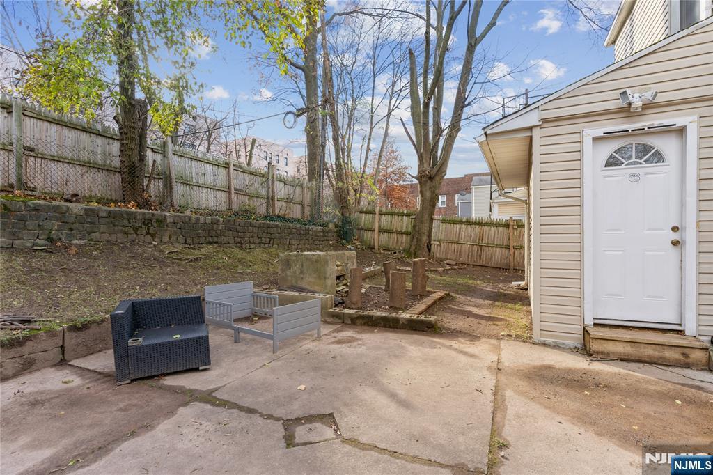 656 Scotland Road Orange, NJ 07050 - Photo 21 of 23 a view of backyard with outdoor seating