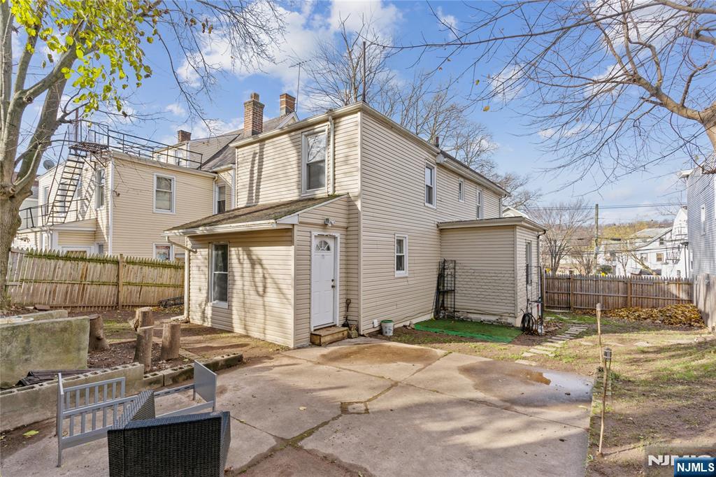 656 Scotland Road Orange, NJ 07050 - Photo 22 of 23 a view of a house with a patio