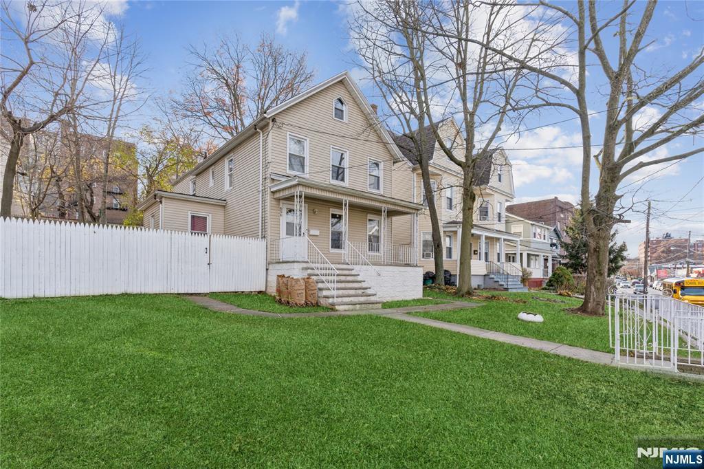 656 Scotland Road Orange, NJ 07050 - Photo 23 of 23 a view of a house with a yard