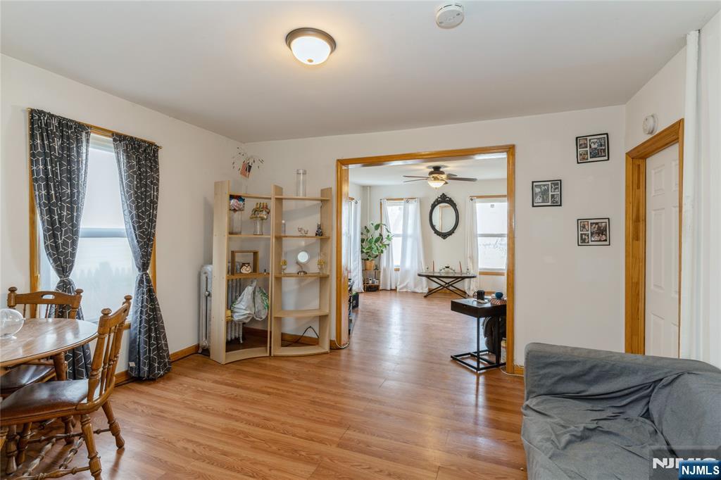 656 Scotland Road Orange, NJ 07050 - Photo 5 of 23 a living room with furniture and wooden floor