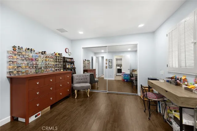 a view of a living room and dining room