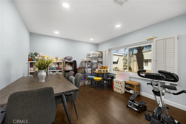 a view of a workspace with furniture and a livingroom