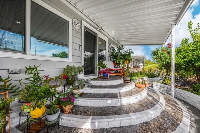 a view of a porch with sitting area