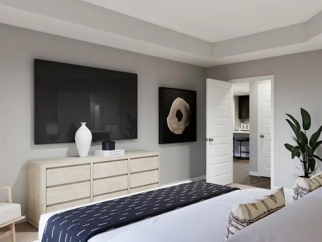 a bathroom with a bathtub a sink and mirror