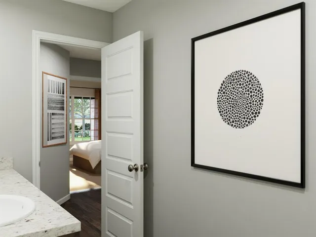 a view of a swimming pool with a table and chairs