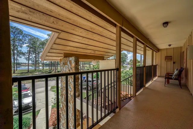 a view of a hallway with windows