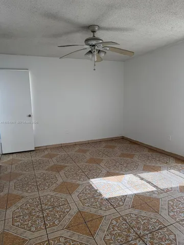 a view of a room with a shelf