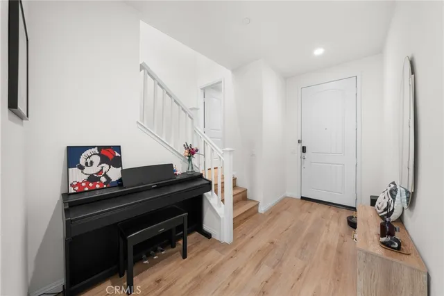 a room with furniture and wooden floor