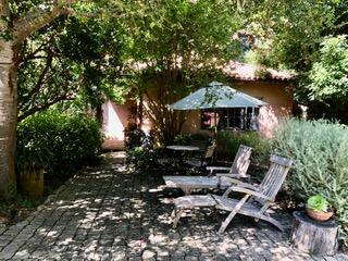 0 East Valley Road Montecito, CA 93108 - Photo 2 of 10 a view of patio with chairs and potted plants