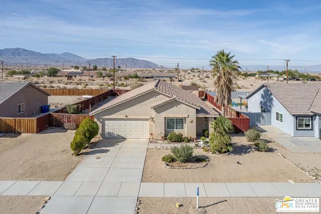 a view of a house with a garden