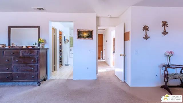 a view of a hallway with closet