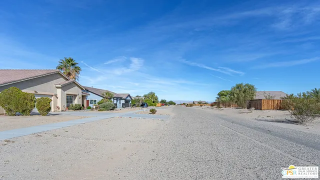 a view of a road with a building in the background