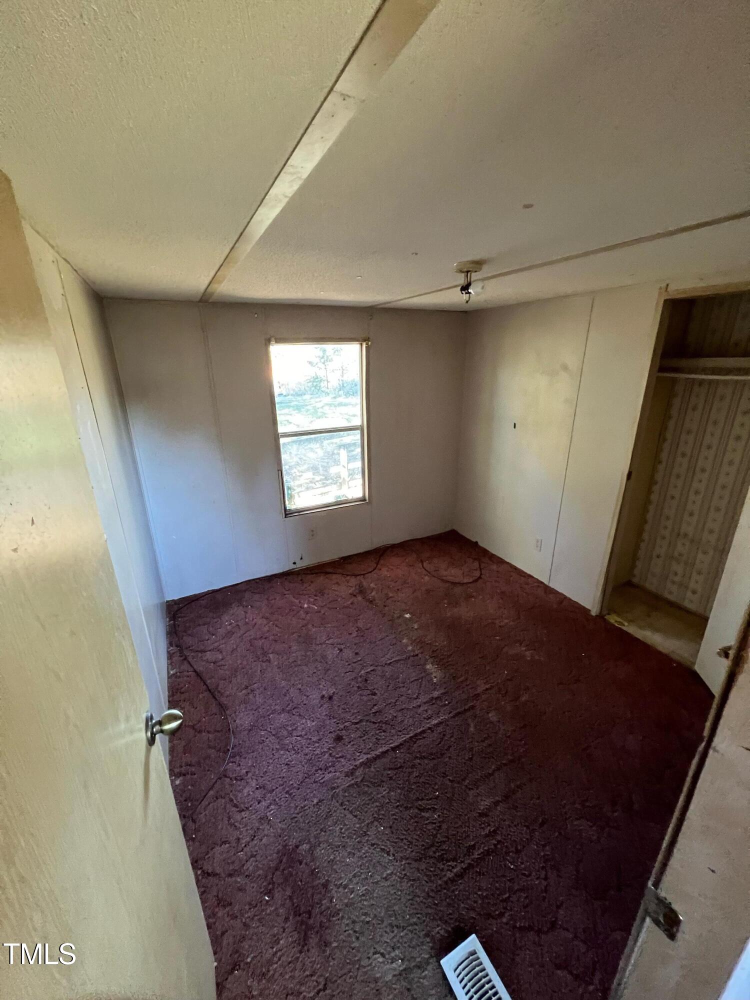377 Mellie Clayton Road Roxboro, NC 27574 - Photo 5 of 14 a view of room and window