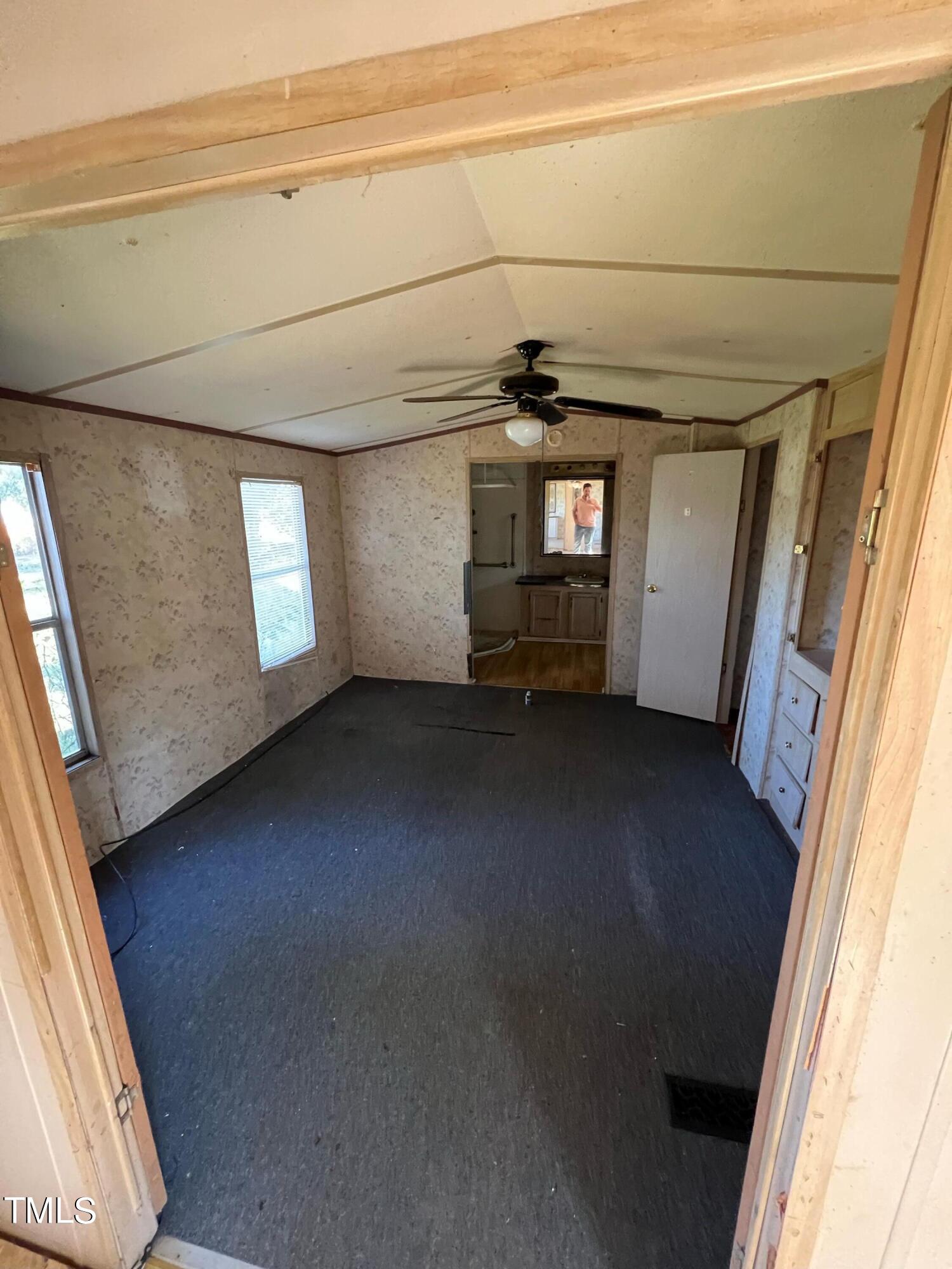 377 Mellie Clayton Road Roxboro, NC 27574 - Photo 8 of 14 a view of empty room with window