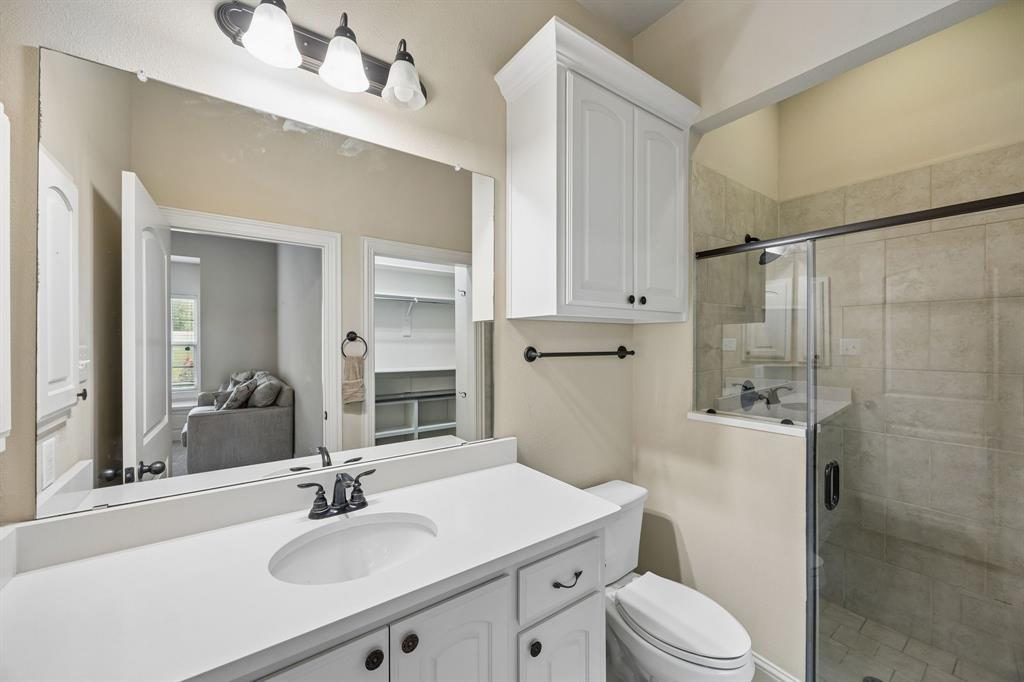 62 Trail Ridge Drive Melissa, TX 75454 - Photo 21 of 39 Bathroom #2 is inside of the guest bedroom and includes a large walk-in closet with built-ins