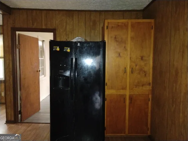 a bathroom with a shower and a sink