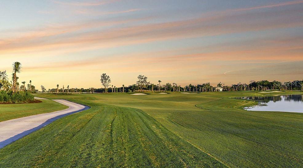 14923 Contenta Loop Bradenton, FL 34211 - Photo 29 of 31 a view of a lake with houses in back