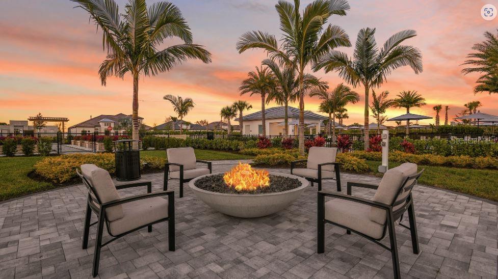 14923 Contenta Loop Bradenton, FL 34211 - Photo 31 of 31 a backyard of a house with outdoor seating