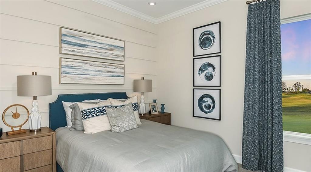 14923 Contenta Loop Bradenton, FL 34211 - Photo 7 of 31 a bedroom with a bed and painting on the wall