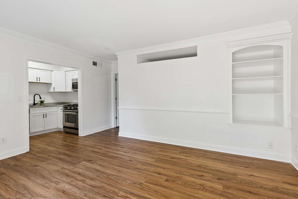 6980 Roswell Road, Unit C13 Atlanta, GA 30328 - Photo 12 of 49 a view of kitchen with wooden floor