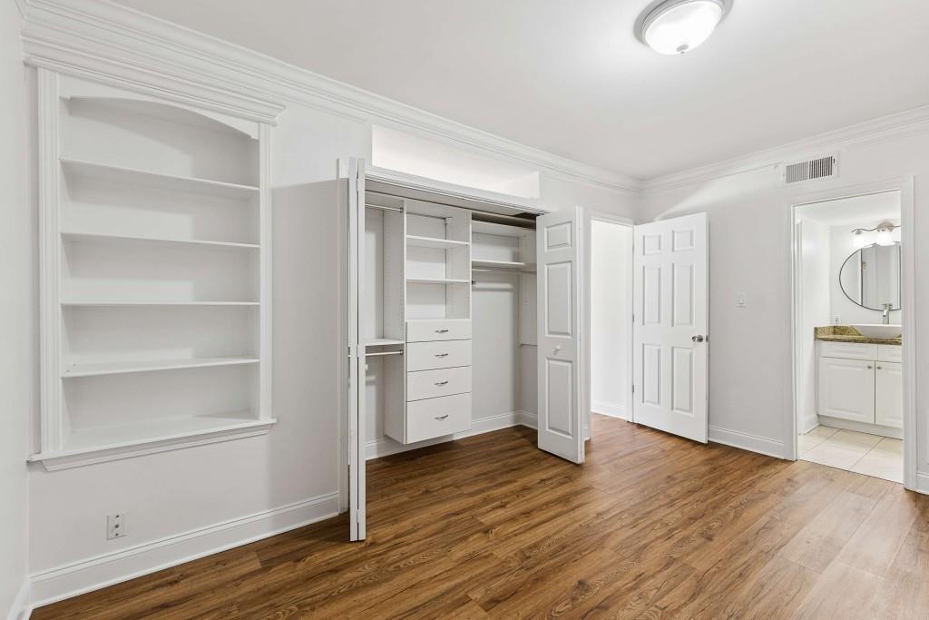 6980 Roswell Road, Unit C13 Atlanta, GA 30328 - Photo 27 of 49 a view of empty room with wooden floor