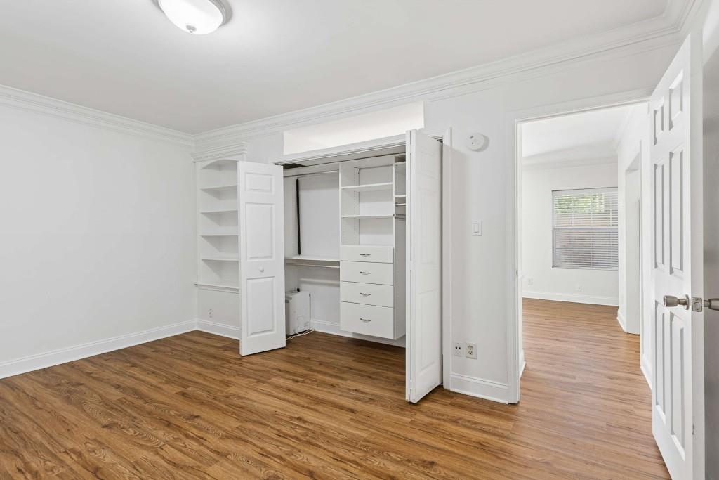 6980 Roswell Road, Unit C13 Atlanta, GA 30328 - Photo 28 of 49 wooden floor in an empty room
