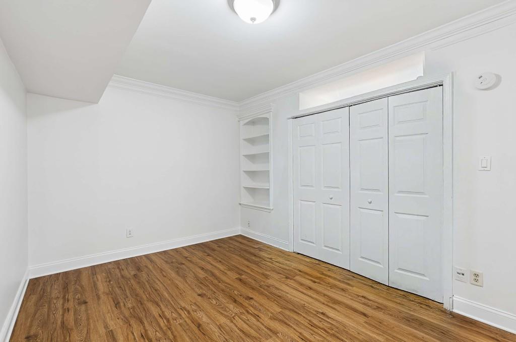 6980 Roswell Road, Unit C13 Atlanta, GA 30328 - Photo 29 of 49 a view of empty room with wooden floor