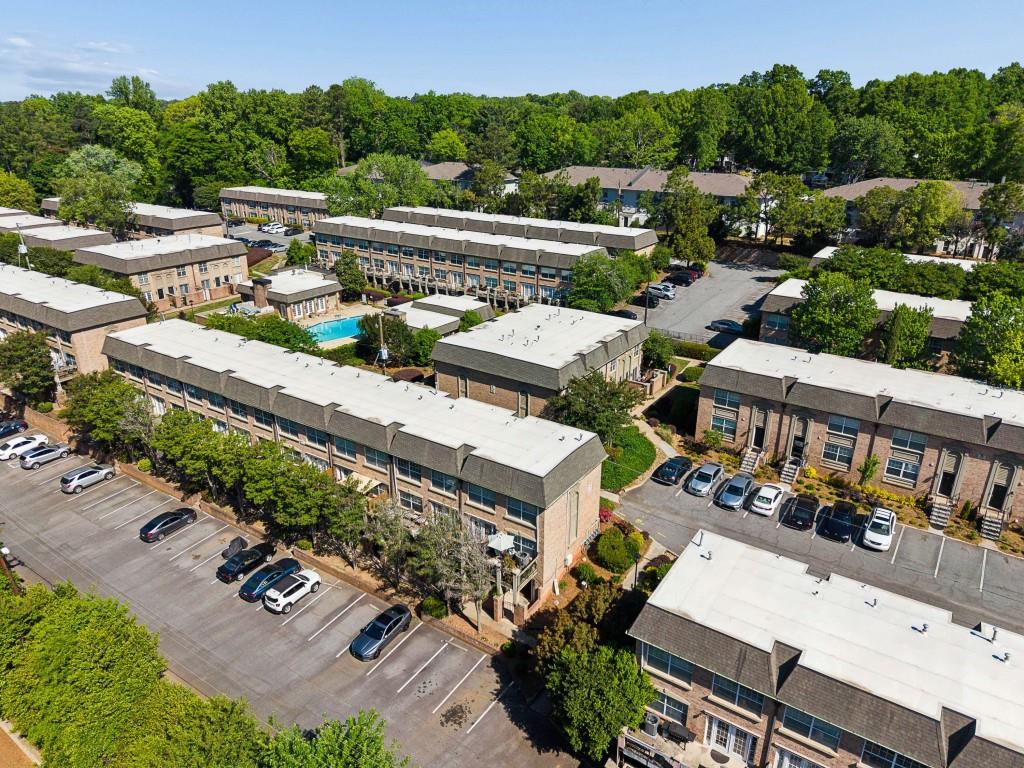 6980 Roswell Road, Unit C13 Atlanta, GA 30328 - Photo 48 of 49 an aerial view of a house with a garden