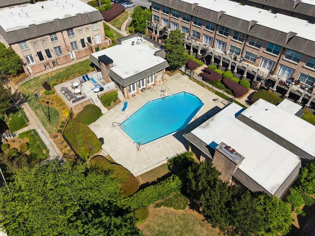 6980 Roswell Road, Unit C13 Atlanta, GA 30328 - Photo 49 of 49 an aerial view of a house with swimming pool and outdoor seating