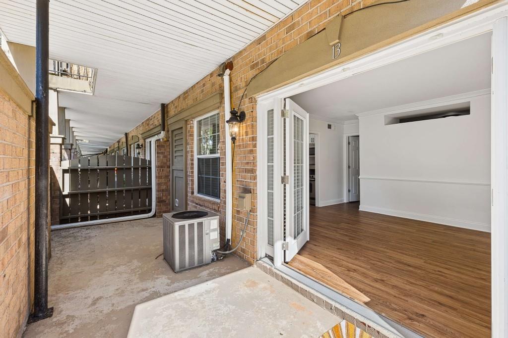 6980 Roswell Road, Unit C13 Atlanta, GA 30328 - Photo 9 of 49 a view of front door and porch
