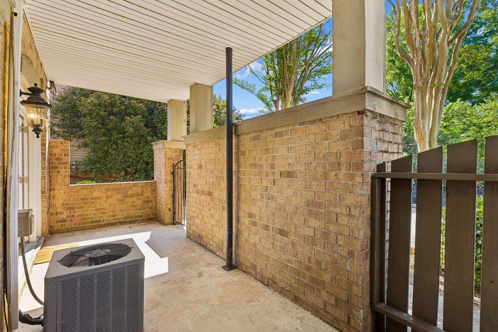 6980 Roswell Road, Unit C13 Atlanta, GA 30328 - Photo 10 of 49 a backyard of a house with seating space