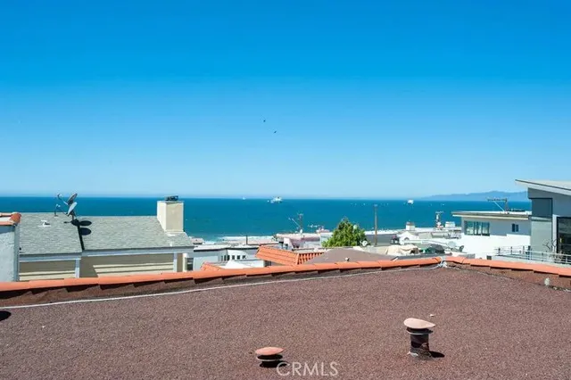 a room with lots of furniture and clutter