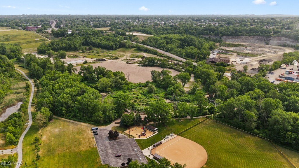 5000 Warner Road Garfield Heights, OH 44125 - Photo 27 of 41 Drone / aerial view of a tree filled landscape