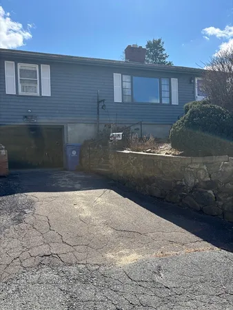 a front view of a house with yard