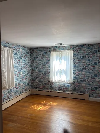 a view of lot of kitchen and window