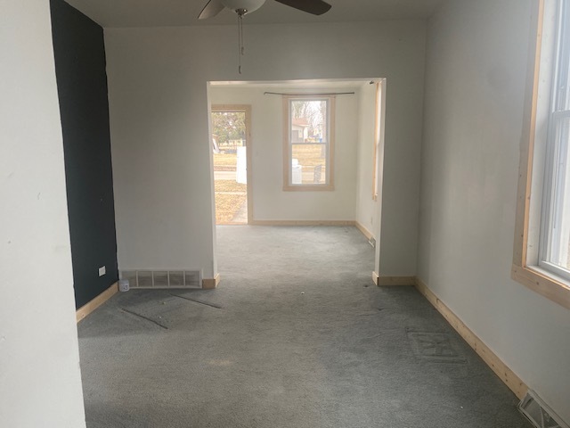 215 West 5th Street Spring Valley, IL 61362 - Photo 3 of 7 an empty room with windows and closet