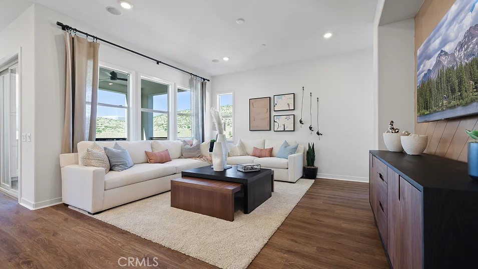 965 Walnut Terrace Montebello, CA 90640 - Photo 11 of 36 a living room with furniture and a flat screen tv