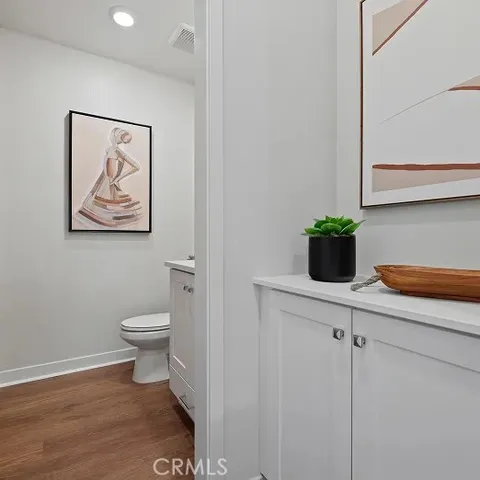 a bedroom with bed and a window