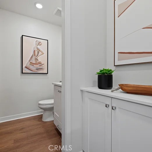 965 Walnut Terrace Montebello, CA 90640 - Photo 13 of 36 a view of bathroom with toilet and small racks